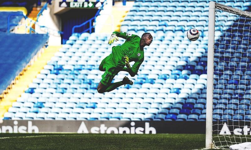 Edouard Mendy gets his fingertips on to a Tyler Roberts shot.